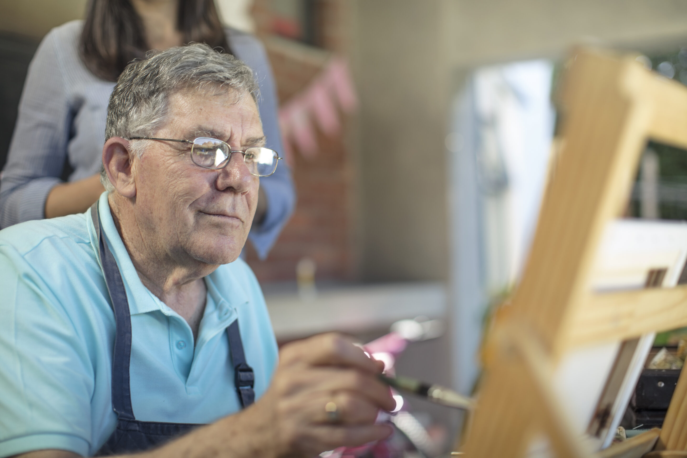 Senior man painting